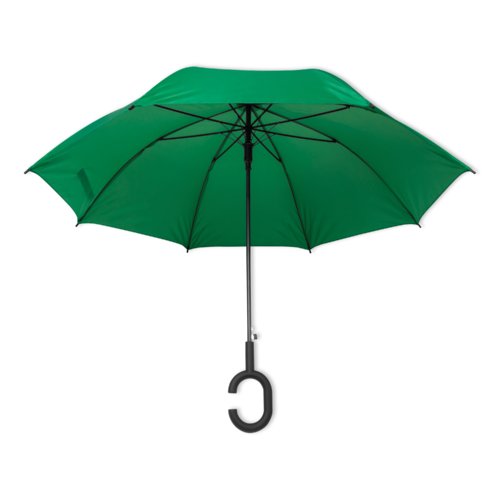 Grn paraply med specielt hndtag.