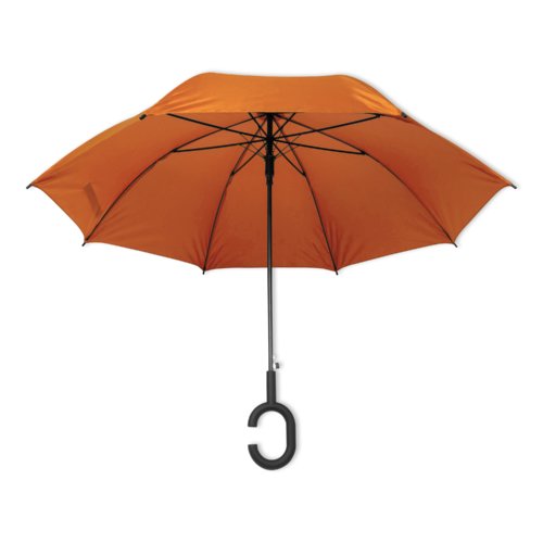 Orange paraply med specielt hndtag.