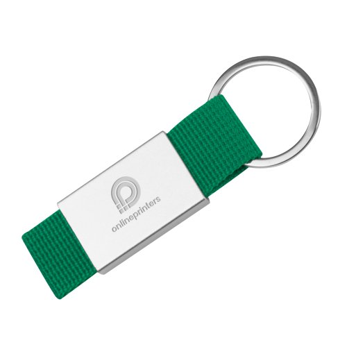 Grn stof nglering med metalring.