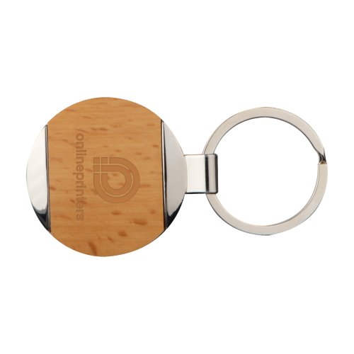 Brun metal- og tr-nglering med mnster og metalring.