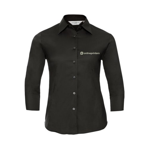 Sort bluse med lange rmer og knaplukning.